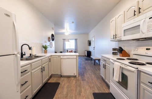 Evergreen House | Centrally-located two bedroom, two bathroom townhome with washer and dryer in a quiet neighborhood