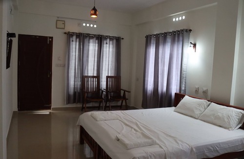 Alwaye Hotel | Chael Airport Residency Double Room Non AC, Nedumbbassey,Cochin .