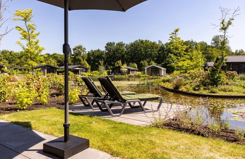 Municipality of Veldhoven Ski Chalet | Chalet by Pond in Holiday Park