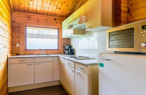Gramsbergen Ski Chalet | Chalet in a park with indoor and outdoor pool