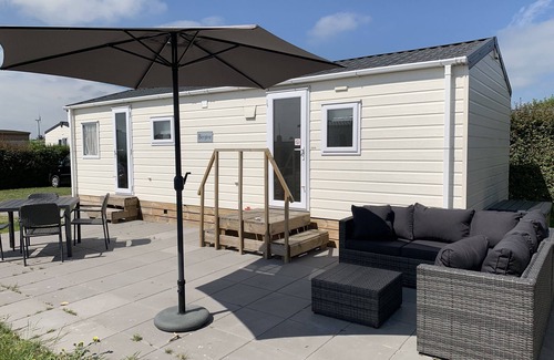 Kamperland Ski Chalet | Chalet Lynn on the beach and sea (Oosterschelde)