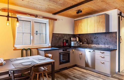 Farchant Ski Chalet | Chalet Rauschn with mountain view with whirlpool, shared sauna, terrace, balcony.