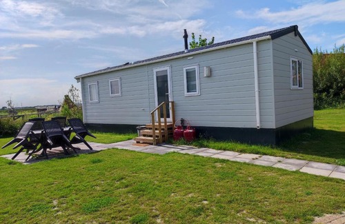 Grijpskerke Ski Chalet | Chalet Weizicht op minicamping Hoogelande