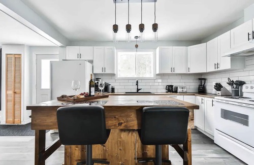 Chertsey Ski Chalet | Chalet with waterfront, Spa and magnificent view of a regional park