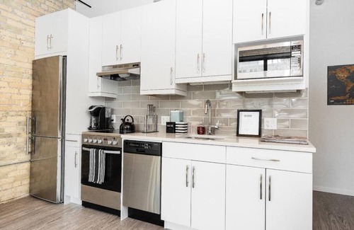 Exchange District Condo | Character 2 Bedroom Loft i hjertet af Winnipeg