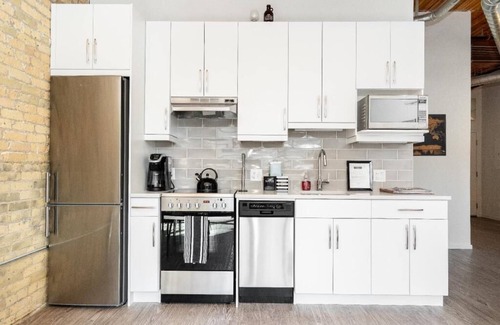Exchange District Condo | Character 2 Bedroom Loft i hjertet af Winnipeg