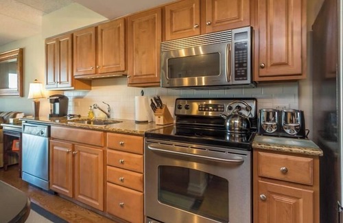 Sussex County Condo | Charming 1-BDR Condo with Stunning Marina Views & Rooftop Pool at South Dewey