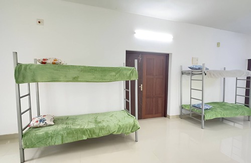 Quilandi House | Charming 1-bedroom house in Koyilandy with WiFi access