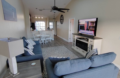 Capri Isle House | Charming 2 Bed Treasure Island Townhouse, heated community pool.