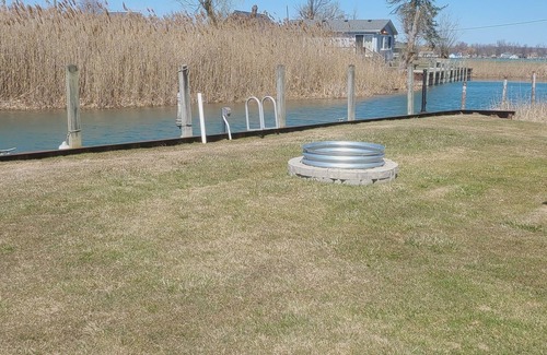 Harsens Island Cottage | Charming 2-bedroom cottage with WiFi, AC on a peaceful Harsens Island canal.