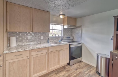Southside Rural Community House | Charming 2-bedroom 2-full bath home with fishing dock, kayaks, WiFi, AC and more