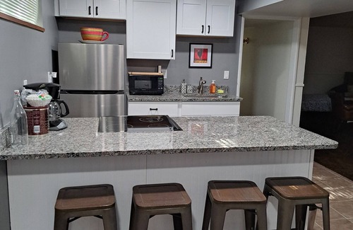 Millcreek Apartment | Charming 2-bedroom basement apartment with fireplace, AC, WiFi in Millcreek