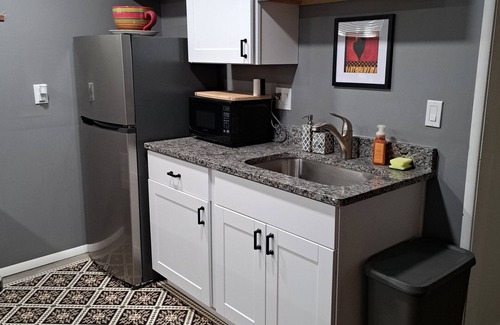 Millcreek Apartment | Charming 2-bedroom basement apartment with fireplace, AC, WiFi in Millcreek