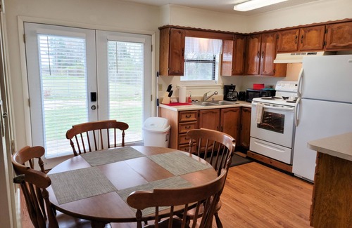 Idabel Apartment | Charming 2 Bedroom Duplex Cottage with All Amenities