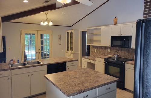 Midland House | Charming 3-bedroom house secluded on 2 acers, but close to everything.