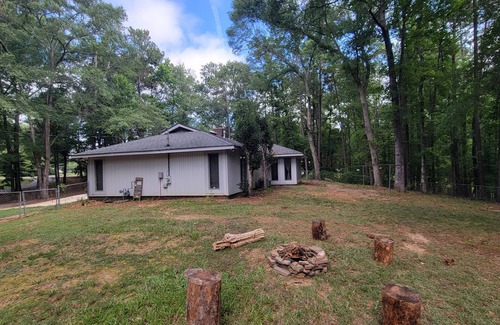Midland House | Charming 3-bedroom house secluded on 2 acers, but close to everything.