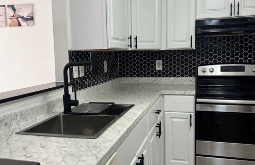 Bowie House | Charming 3-bedroom townhome with WiFi and AC in Bowie Maryland.