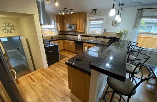 Cheyenne House | Charming 4 Bdrm Brick Avenues Home - minutes from Frontier park and Capitol bldg