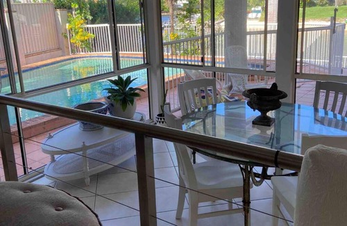 Mermaid Waters House | Charming 4 Bedroom Waterfront Home W/Pool Near Casino