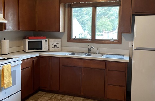 Shawano House | Charming Bungalow Across From Wolf River