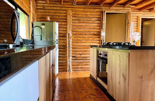 Guarne Cabin | Charming Cabin Getaway in Antioquia: WiFi, Balcony & BBQ