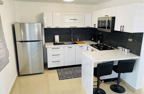 Sabana Abajo House | Charming Carolina blue House 2 Puerto Rico