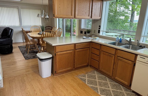 Lake City Cottage | Charming Cottage on Sandy Beach with Beautiful Lake Views from Large Deck