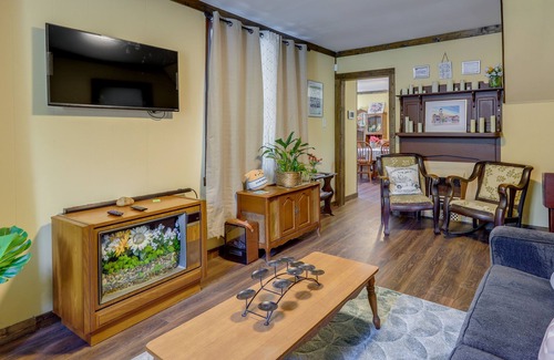 Covington House | Charming Covington Retreat w/ Yard & Sunroom!