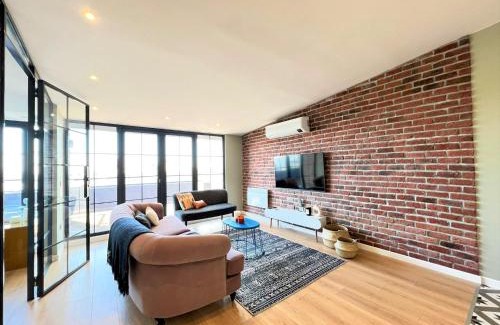 Gumussuyu Mahallesi Apartment | Charming, Designer Apartment with Private Rooftop Terrace, Bathtub, and Sea View in Taksim