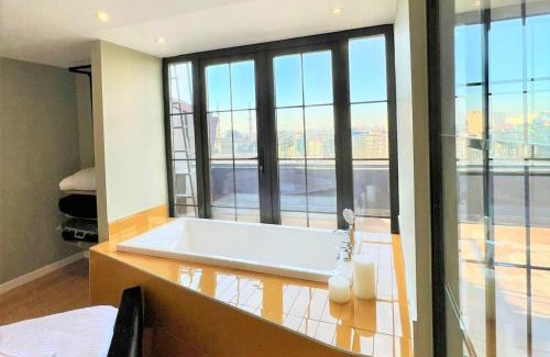 Gumussuyu Mahallesi Apartment | Charming, Designer Apartment with Private Rooftop Terrace, Bathtub, and Sea View in Taksim