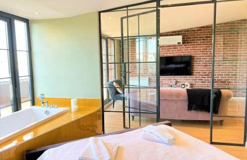 Gumussuyu Mahallesi Apartment | Charming, Designer Apartment with Private Rooftop Terrace, Bathtub, and Sea View in Taksim