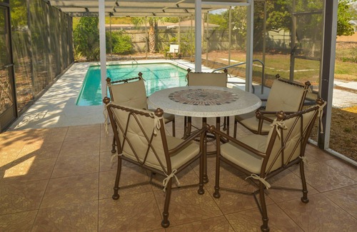 Ringling Park House | Charming Florida bungalow with pool and fenced-in yard.