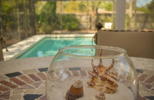 Ringling Park House | Charming Florida bungalow with pool and fenced-in yard.