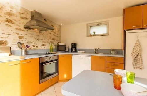 Saint-Brevin-les-Pins Cottage | Charming Stone Cottage Near Beaches with Enclosed Garden and Sports Amenities