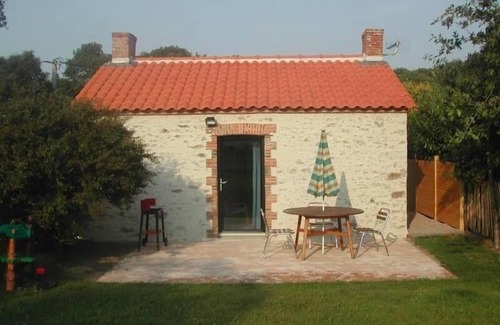 Saint-Brevin-les-Pins Cottage | Charming Stone Cottage Near Beaches with Enclosed Garden and Sports Amenities