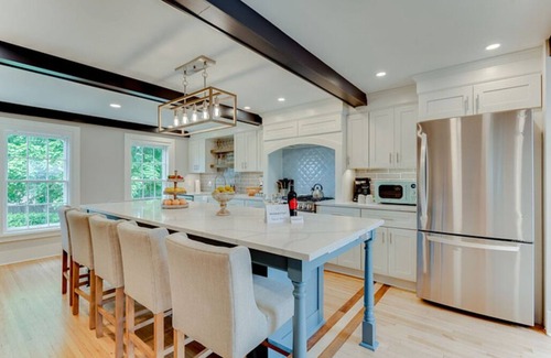Excelsior House | Charming Historic Home with Luxury Suites & Courtyard
