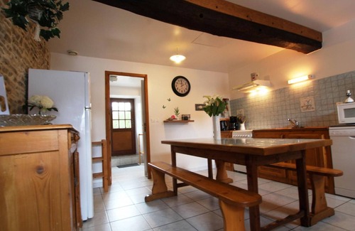 Canville-la-Rocque Cottage | Charming Home Near Portbail Beaches, Enclosed Yard, Fireplace, and Garage