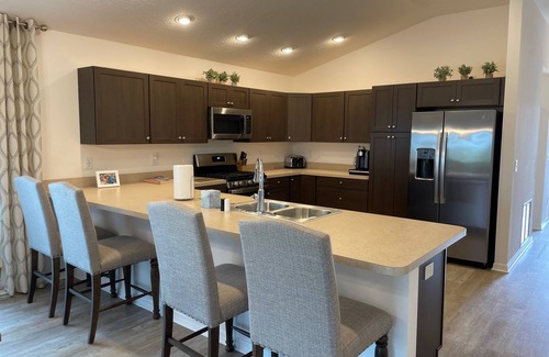 Okahumpka House | Charming home w/spacious kitchen, water view, enclosed lanai, & Pet Friendly