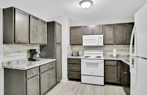 Interchange Square House | Charming home with private W/D, WiFi, and screened in porch