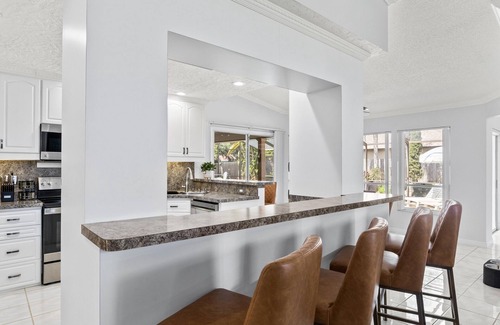 Palma Sola House | Charming house near AMI: Comfort, Style, and Sun Soaked Fun | Private | Pets OK
