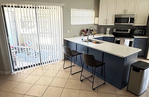Northwest Orlando House | Charming house with AC, fitness equipment, & WIFI in the city of Orlando.