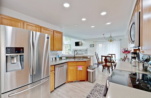 University Area House | Charming house with washer/dryer, fireplace, patio, full kitchen, & WiFi