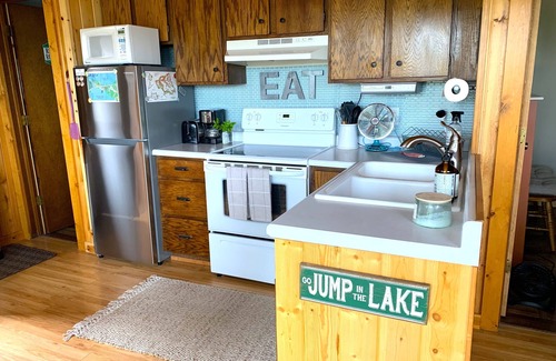 South Haven Cabin | Charming Knotty Pine Cabin w/Incredible Lake Views!