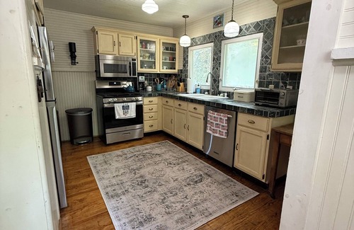 Alanson House | Charming Lakefront Cottage in one of the best locations on Burt Lake