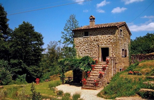 San Leo Bastia House | Charming mill nestled in the Umbrian hills near Lake Trasimeno.