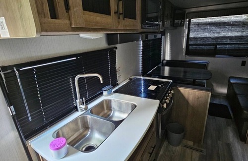 Rural Estates House | Charming mobile home for camping at your favorite locations with AC . Sleeps 6 .