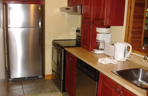 Mont-Tremblant Condo | charming newly renovated condo decorated with French Canadian antiques