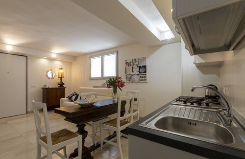 Fertilia Apartment | Charming Seafront Apartment with garden and patio