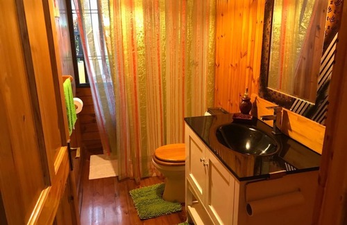 Signal Hill Cabin | Charming SEAVIEW lodge TUCKED IN THE MOUNTAINSIDE of Signal Hill TOBAGO