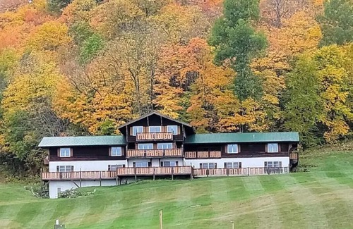 Upson Ski Chalet | Charming, ski-in, ski-out, lake-view chalet w/10 bedrooms, kitchen and AC.